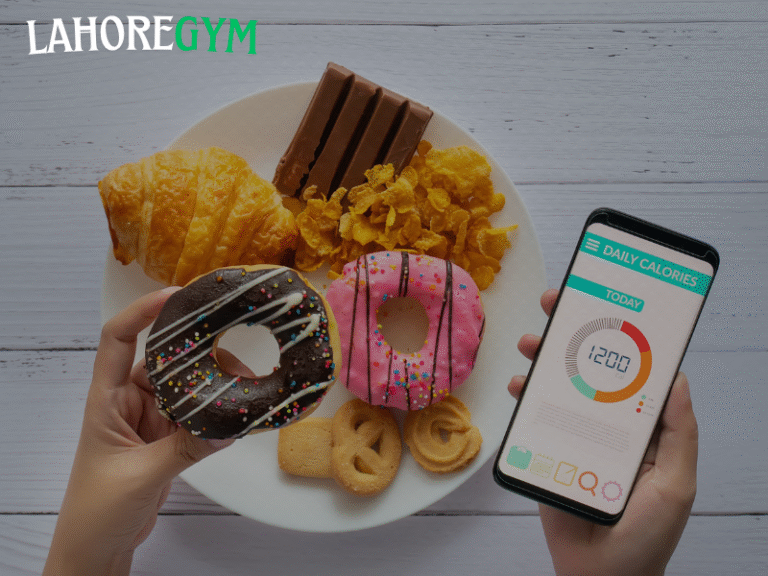 Person using a fitness tracking app to monitor calories, steps, and workouts on a smartphone