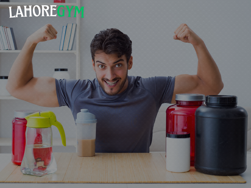 Top muscle growth supplements including protein powder and creatine on gym table