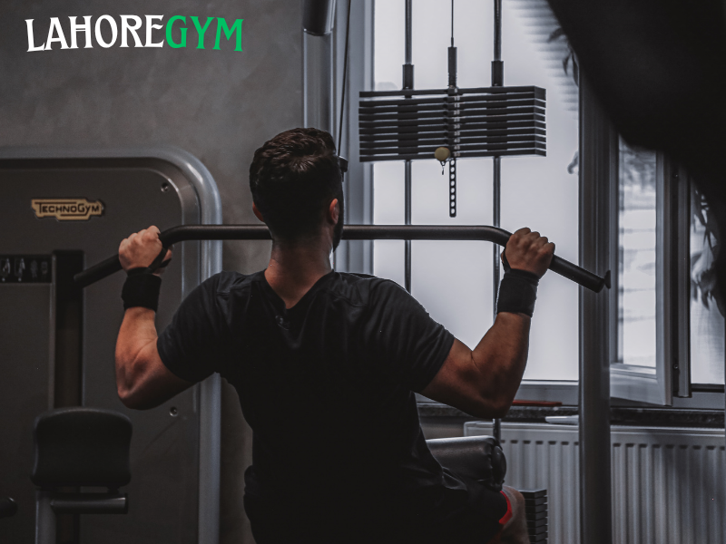 Athlete performing compound exercises for maximum strength at the gym