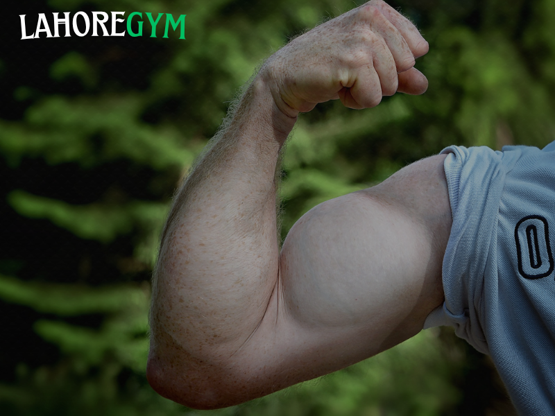 Athlete flexing muscles after an intense workout with a strong pump